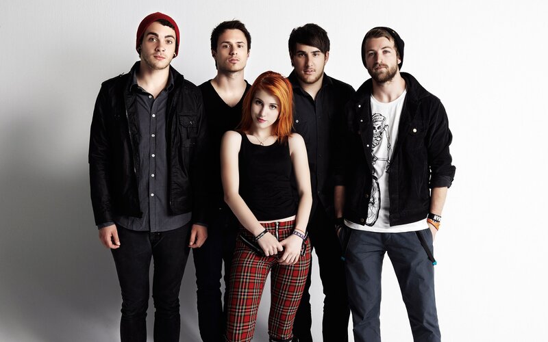 band with red-haired woman