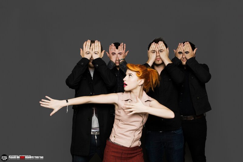 band with red-haired woman