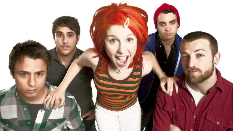 band with red-haired woman