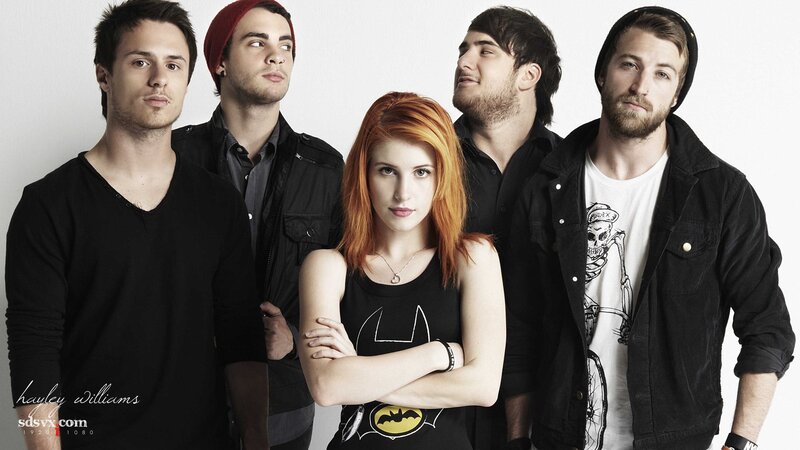 band with red-haired woman