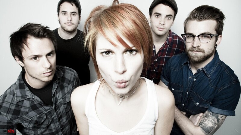 band with red-haired woman