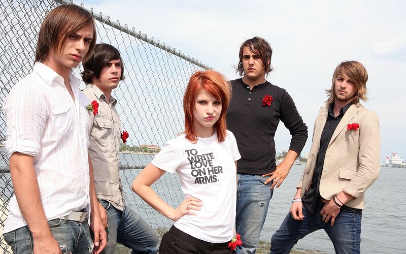 band with red-haired woman