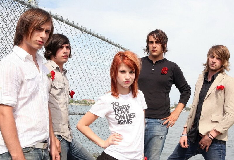 band with red-haired woman