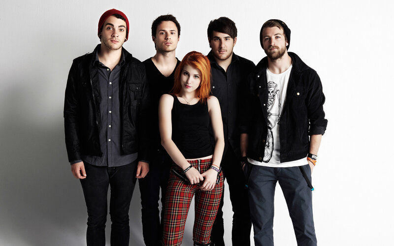 band with red-haired woman