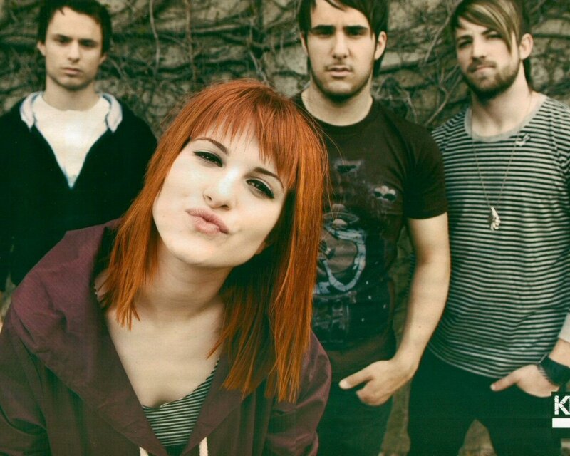 band with red-haired woman