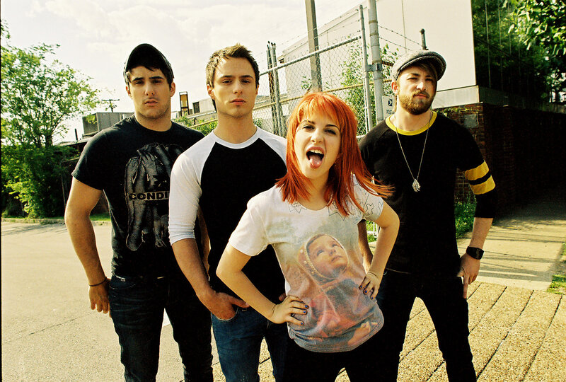 band with red-haired woman