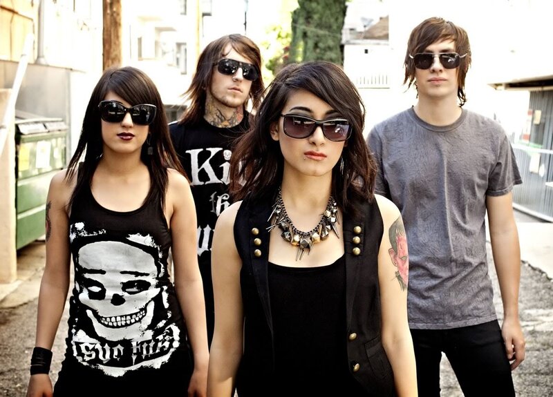 band with sunglasses in alley
