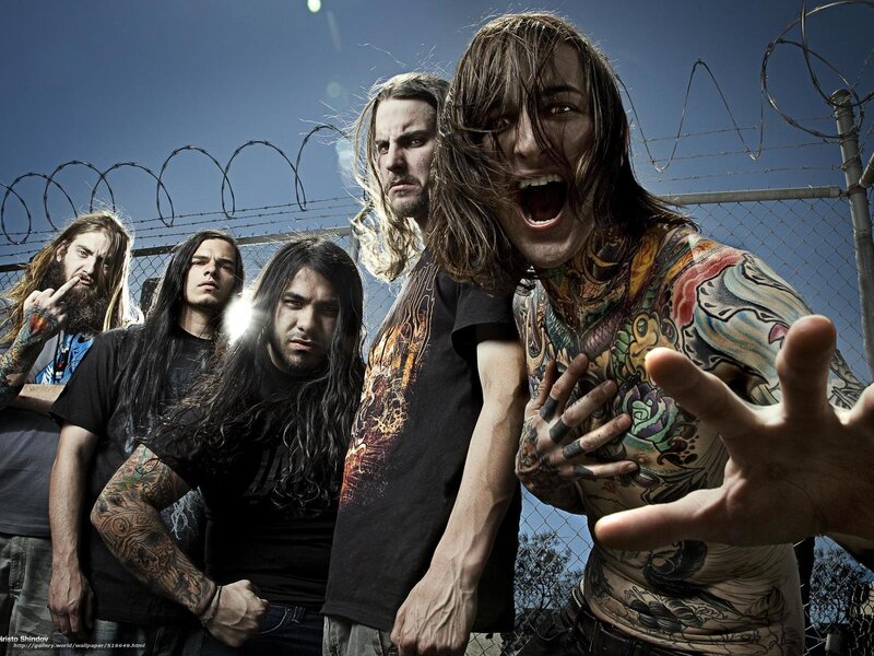 band with tattoos and barbed wire