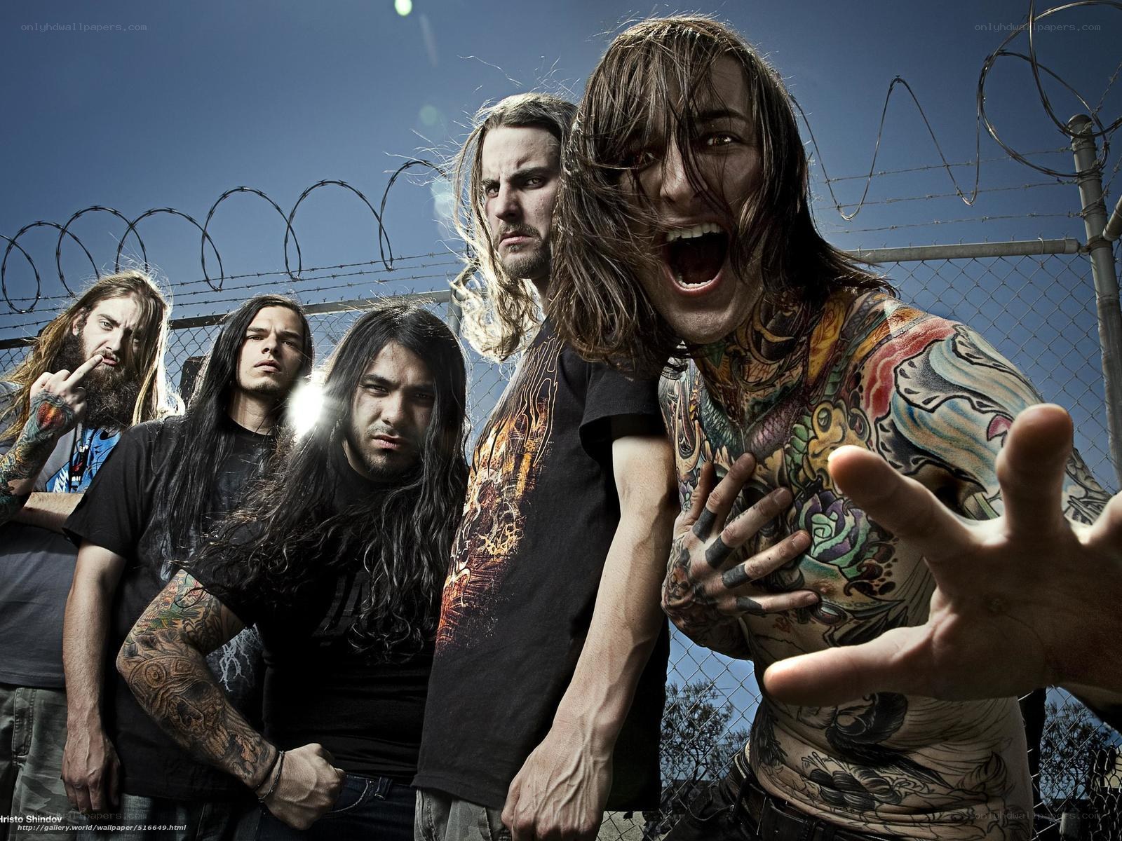 band with tattoos and barbed wire