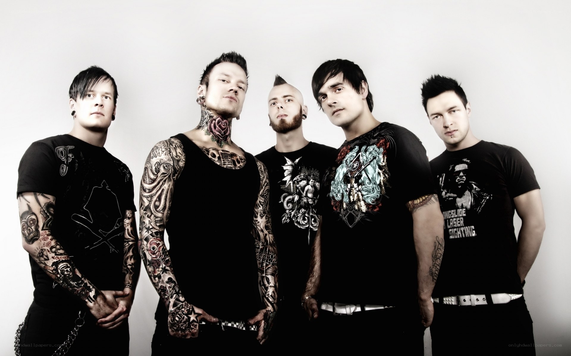 band with tattoos and piercings