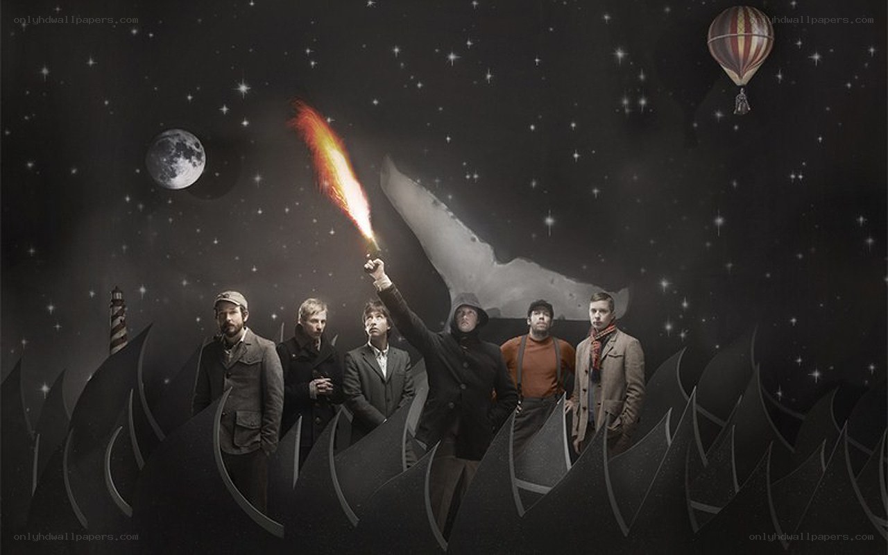 band with torch in starry sky