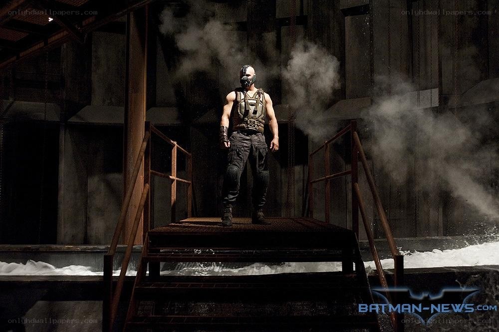 Bane stands on a platform