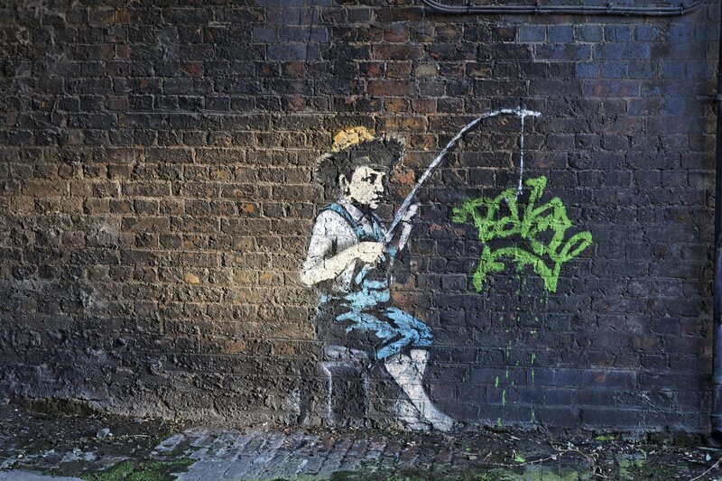 Banksy fishing graffiti