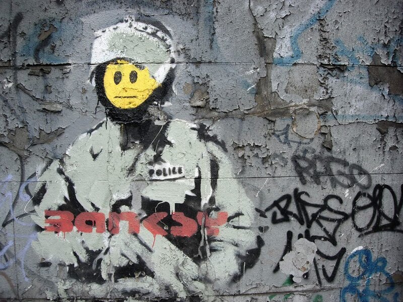 Banksy graffiti of police officer