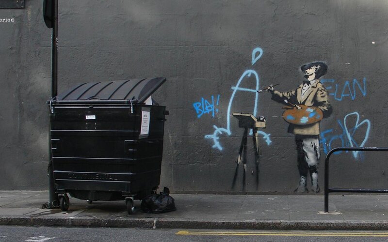 Banksy graffiti on a city wall