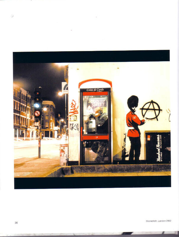 Banksy graffiti on phone booth