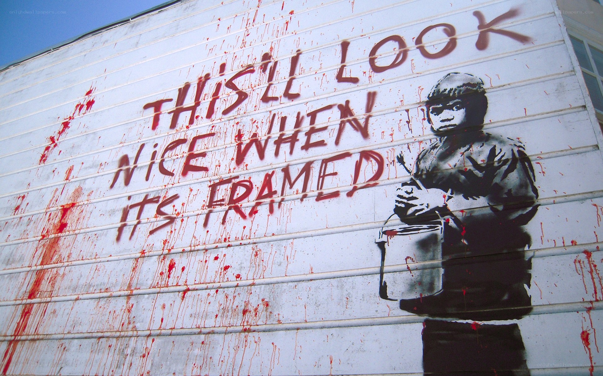 Banksy graffiti with text