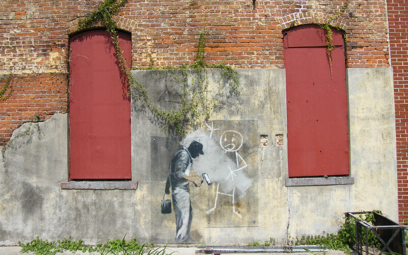 Banksy mural of painter