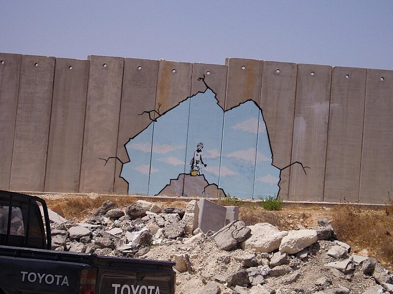 Banksy mural on concrete wall