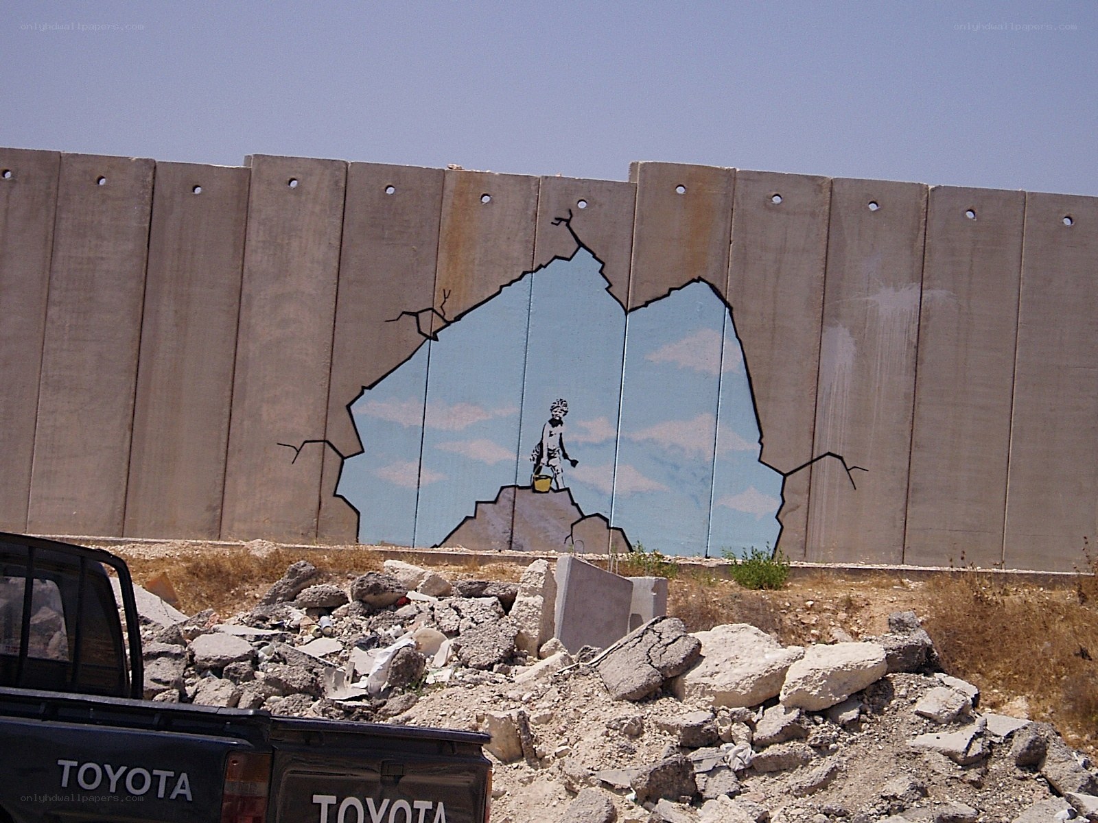 Banksy mural on concrete wall