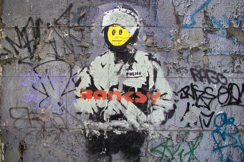 Banksy police officer graffiti