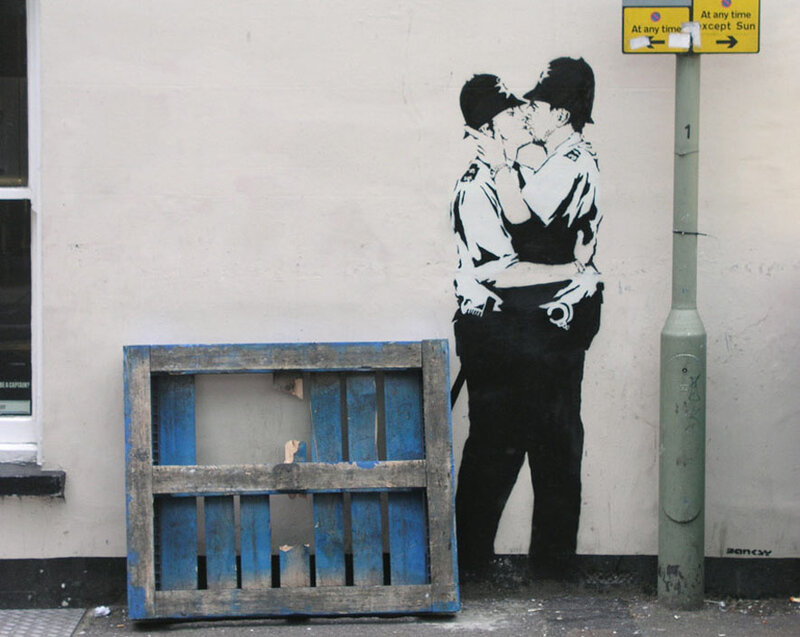 Banksy's kissing police officers