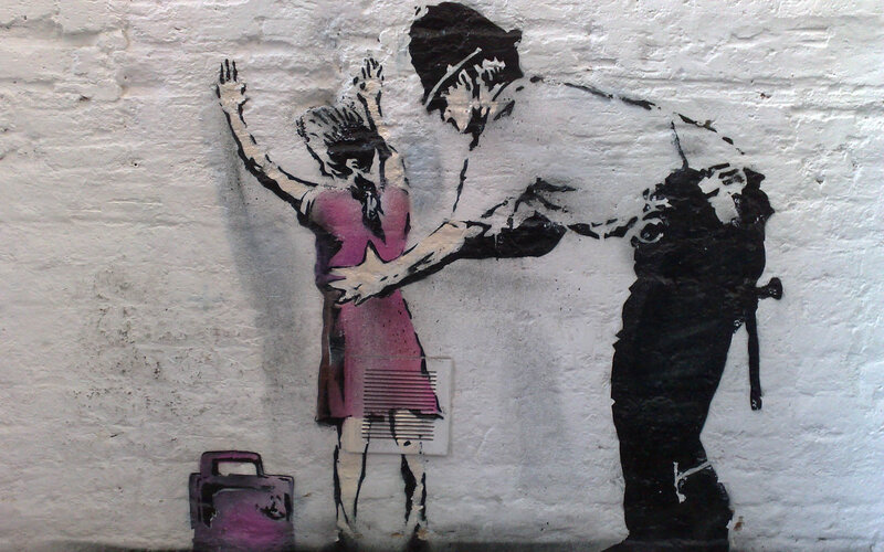 Banksy's police arrest stencil