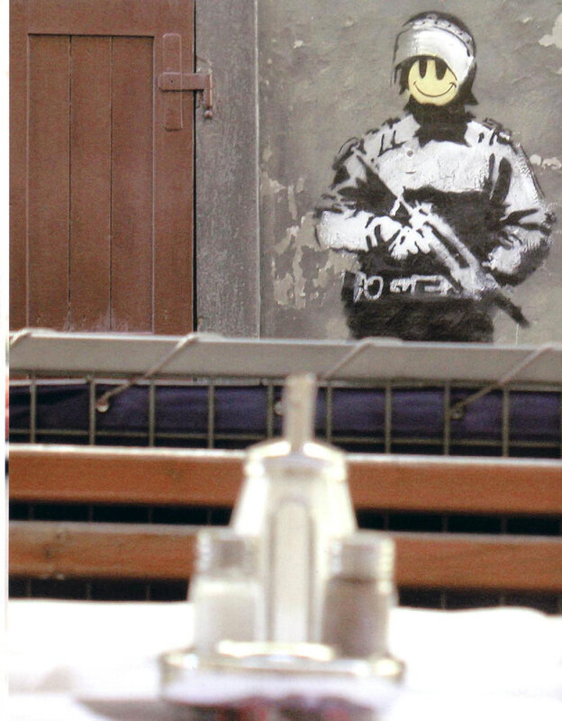 Banksy's Smiley Soldier Graffiti