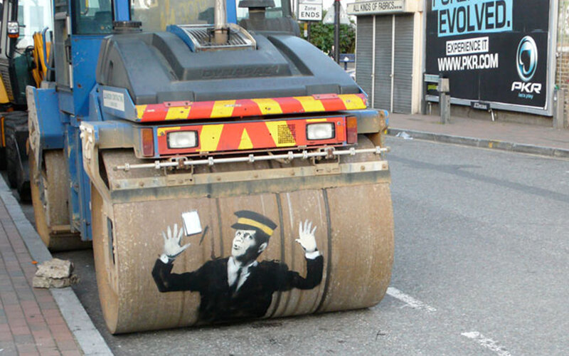 Banksy street art on road roller