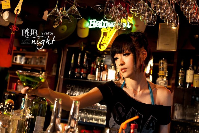 Bar girl serving a drink