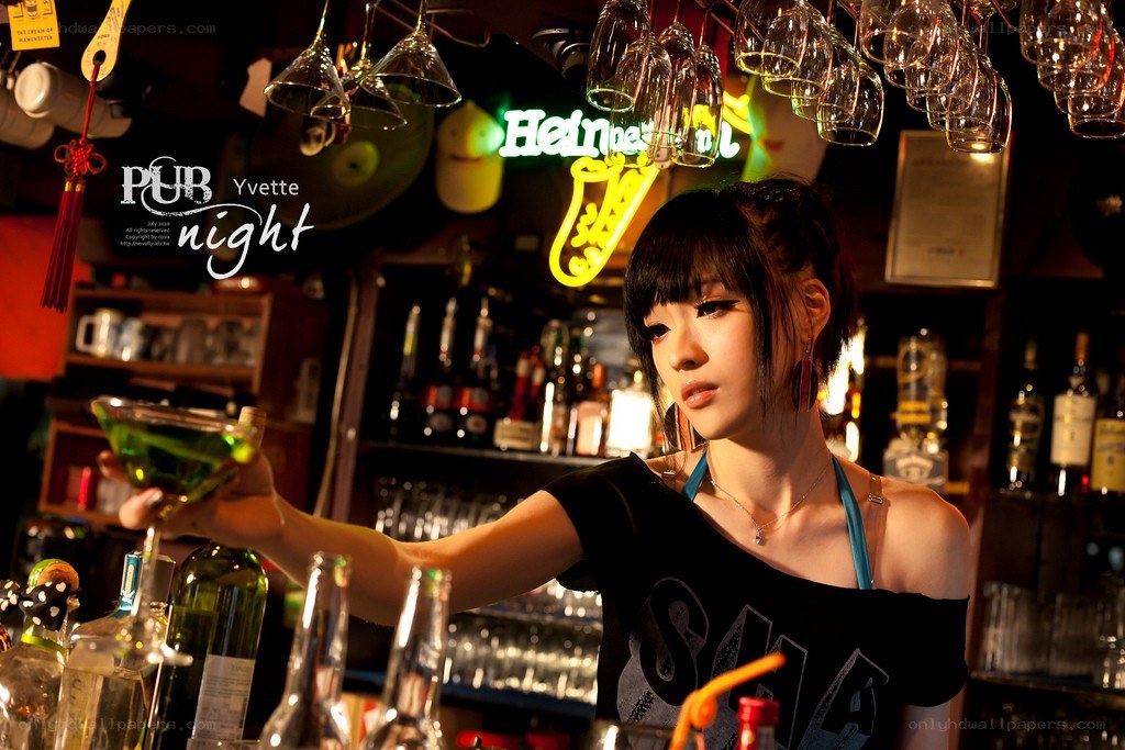 Bar girl serving a drink