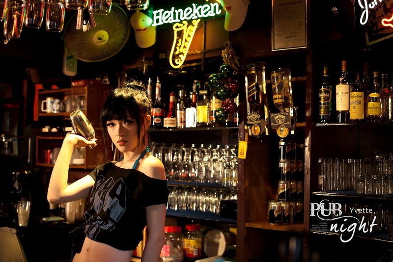 Bar girl with cocktail shaker