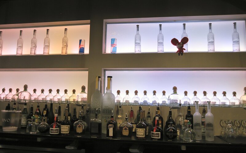 Bar shelves with liquor bottles