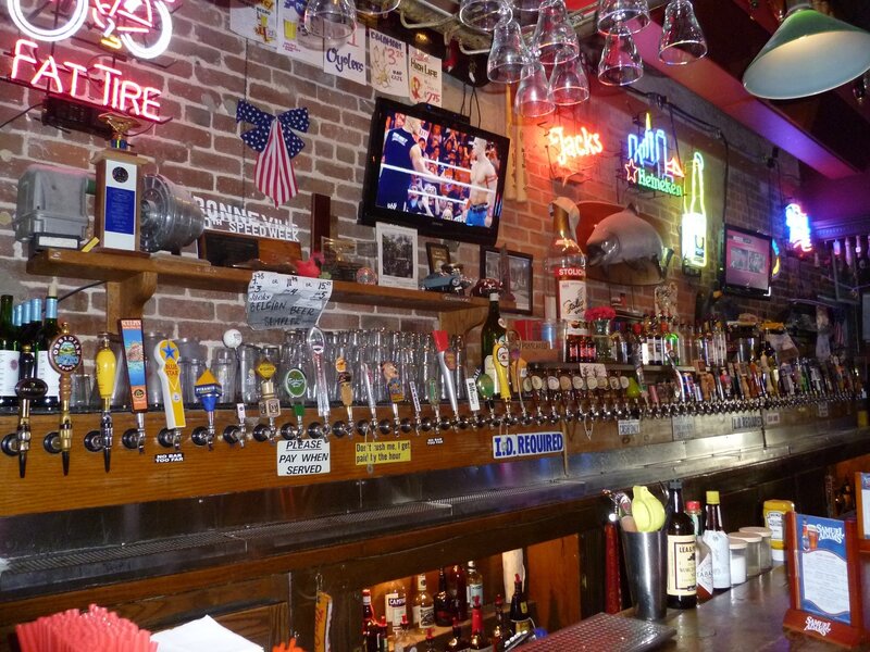 Bar with beer taps and neon signs