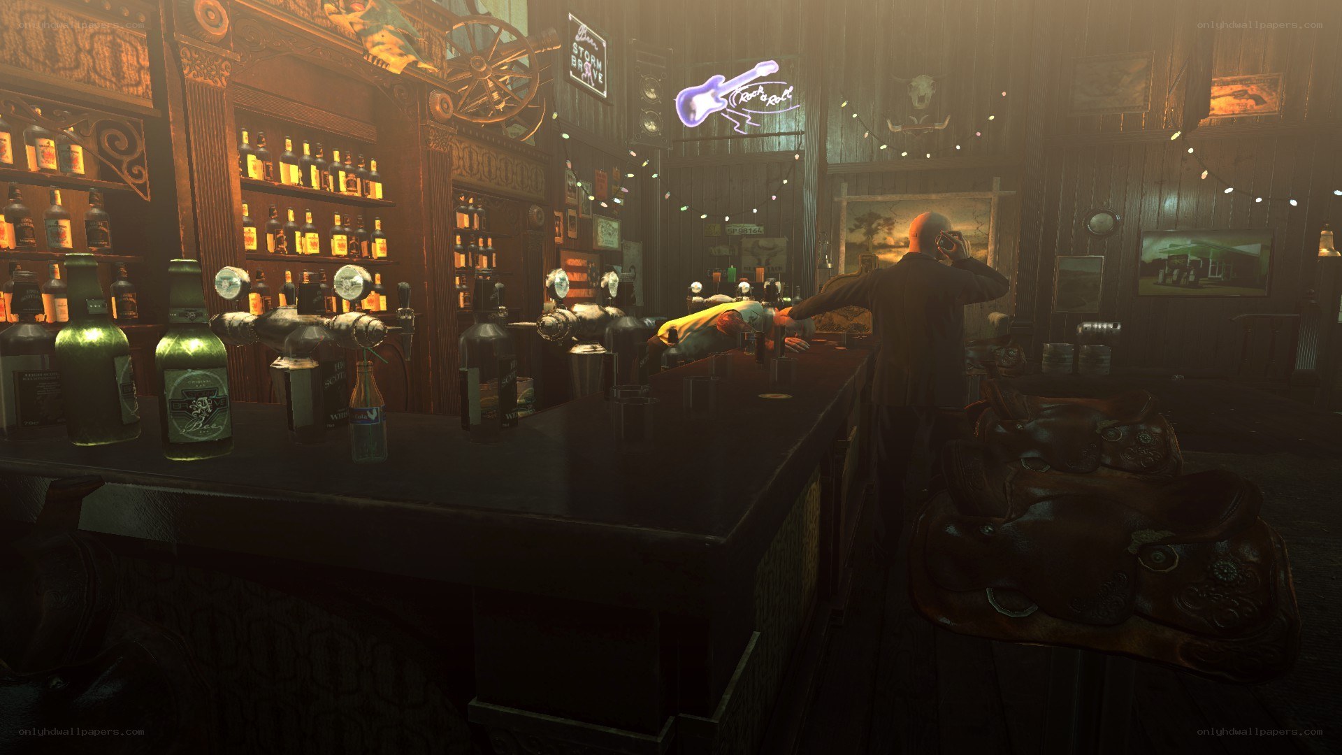 bar with neon guitar sign