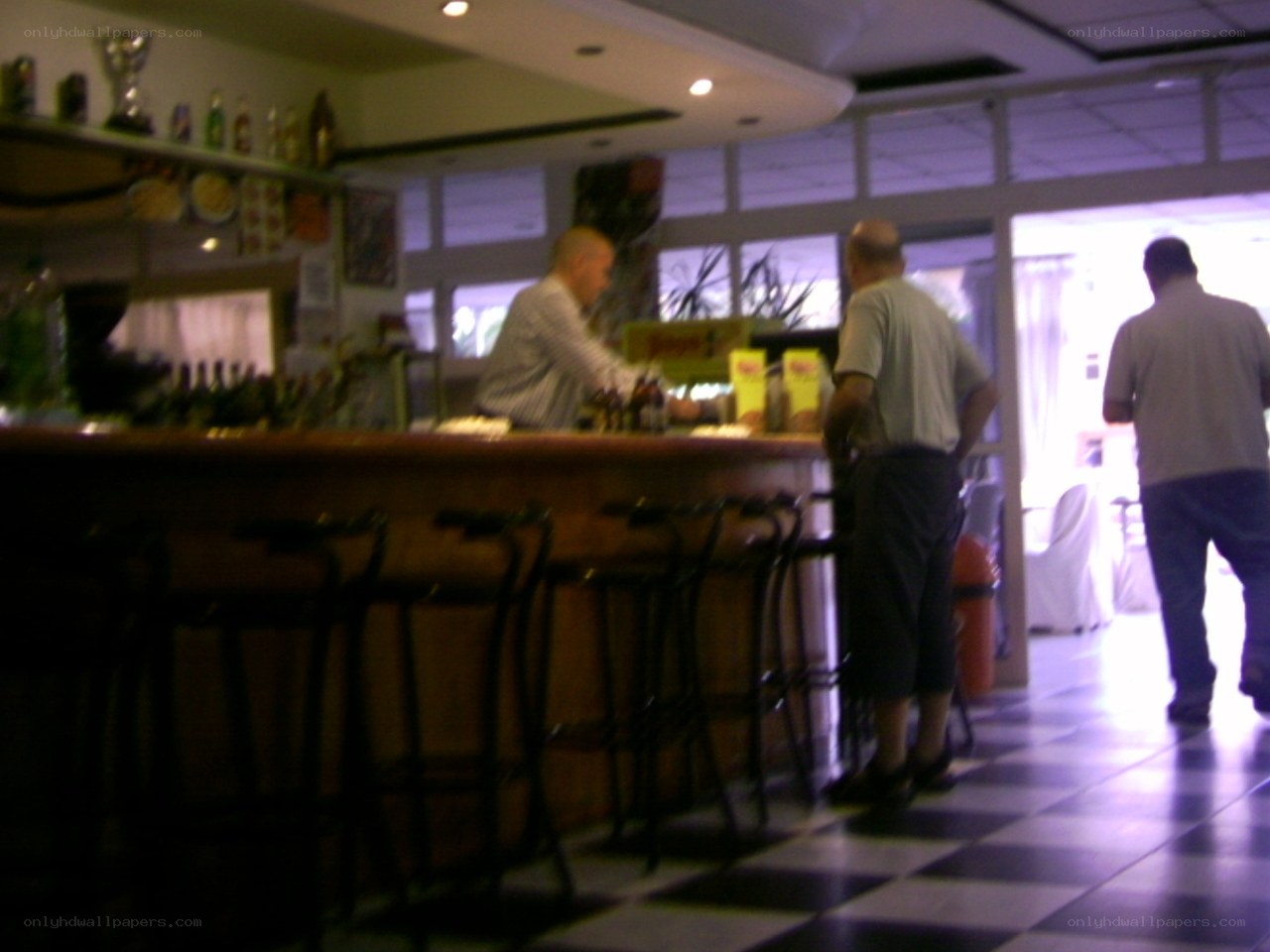 Bar with patrons at night