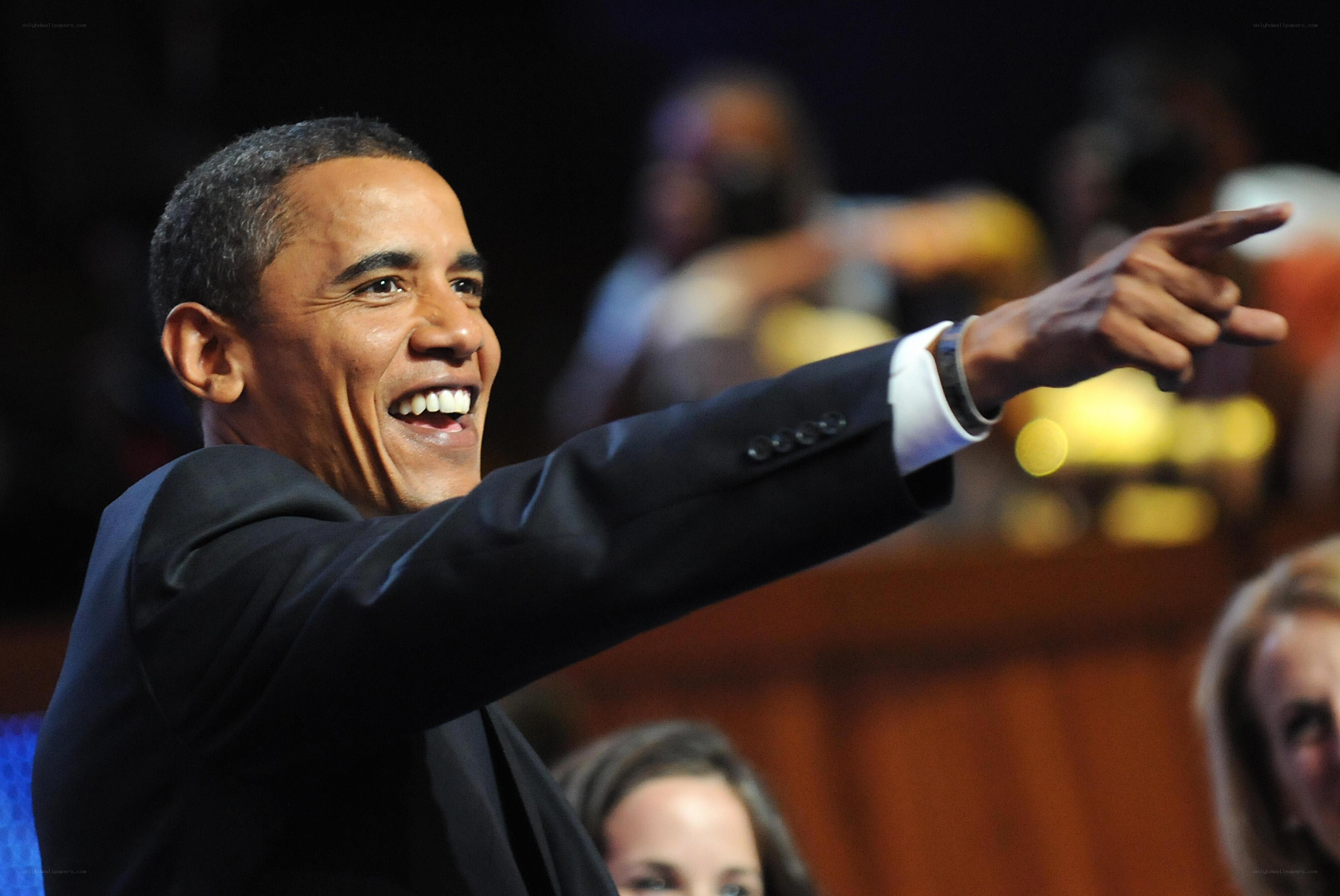 Barack Obama pointing and smiling