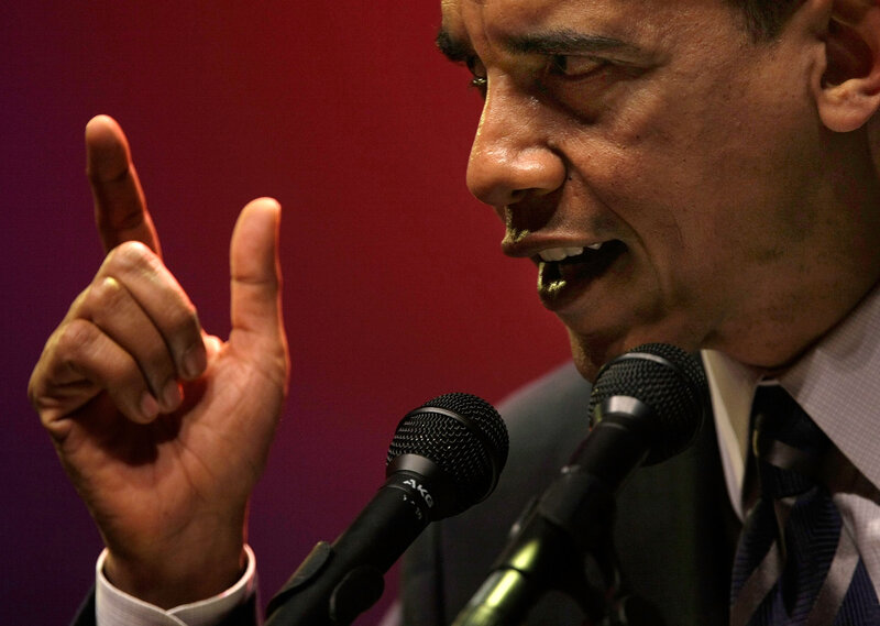 Barack Obama speaking at a podium