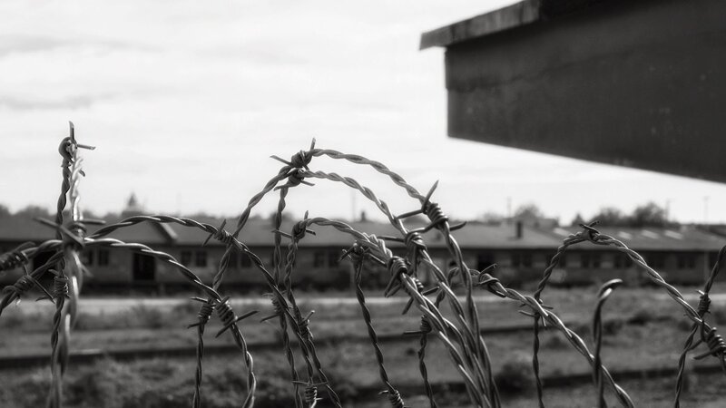 Barbed wire fence at a camp
