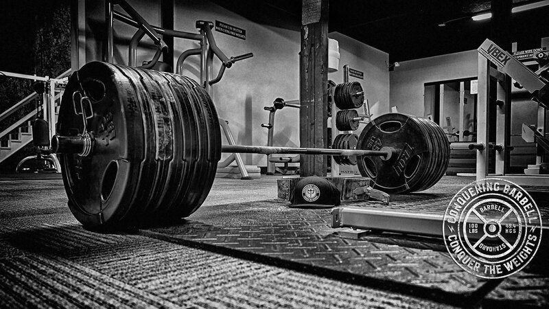 Barbell on Gym Floor