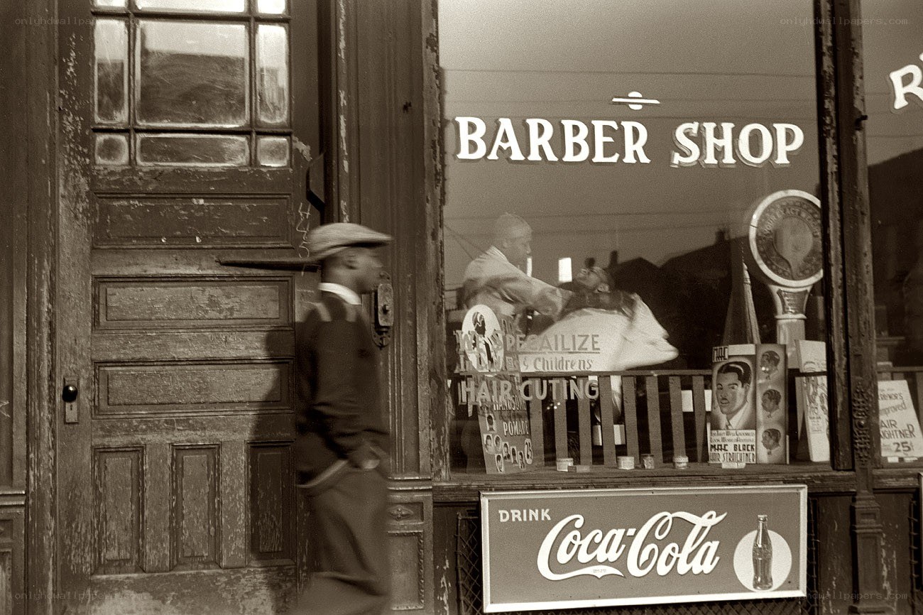 Barber shop scene with man walking by