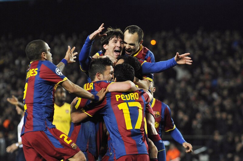 Barcelona players celebrate a goal