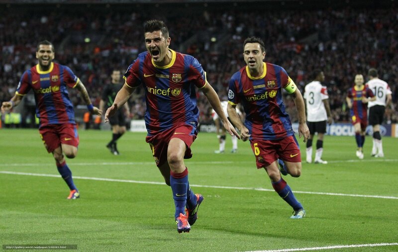 Barcelona players celebrate on field