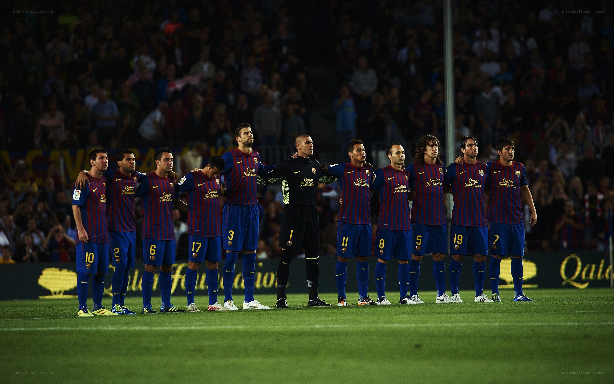 Barcelona players line up before match