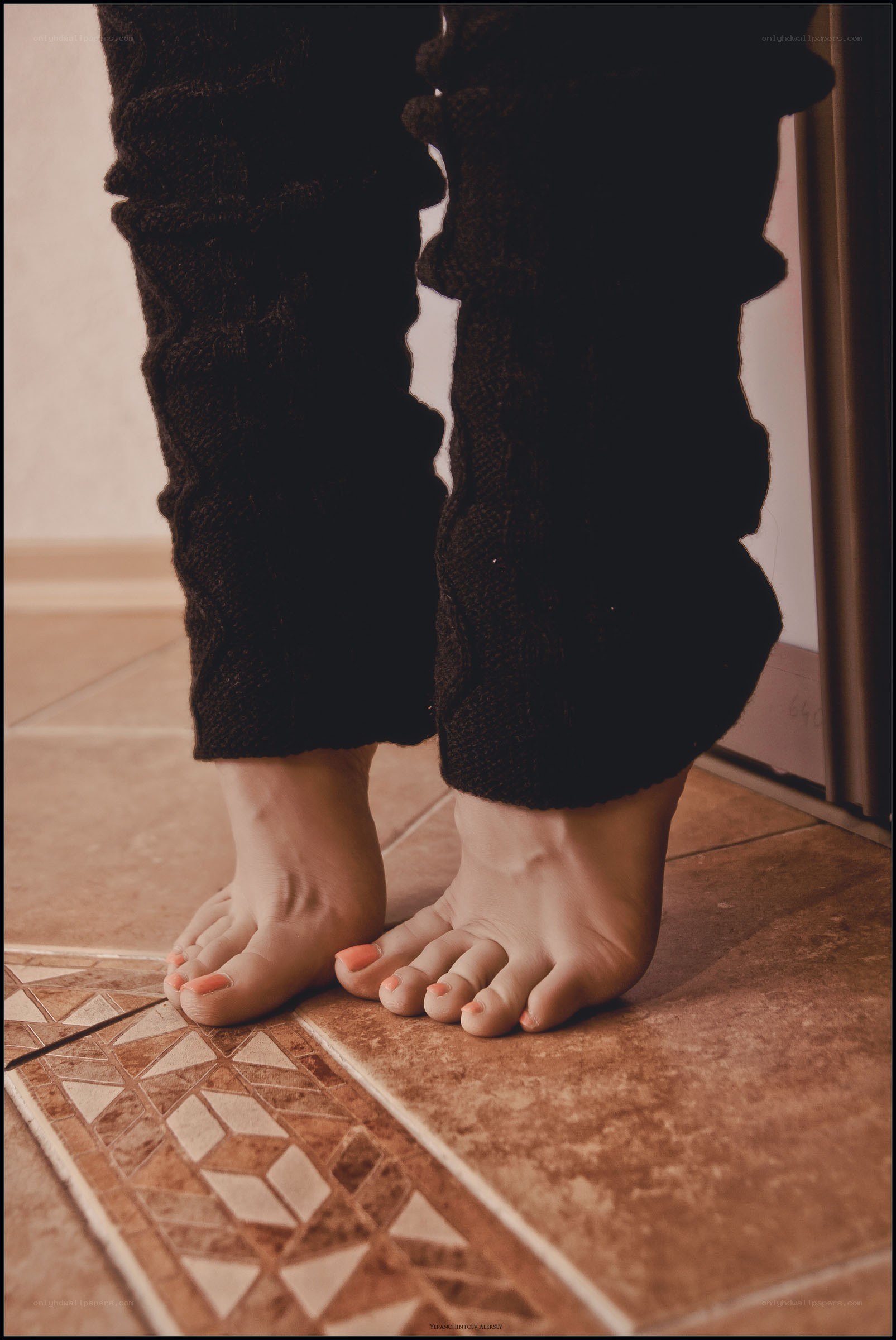 bare feet on tiled floor