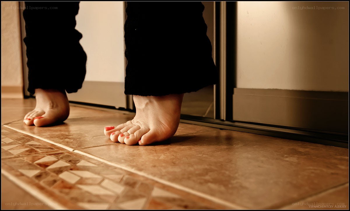 bare feet on tiled floor