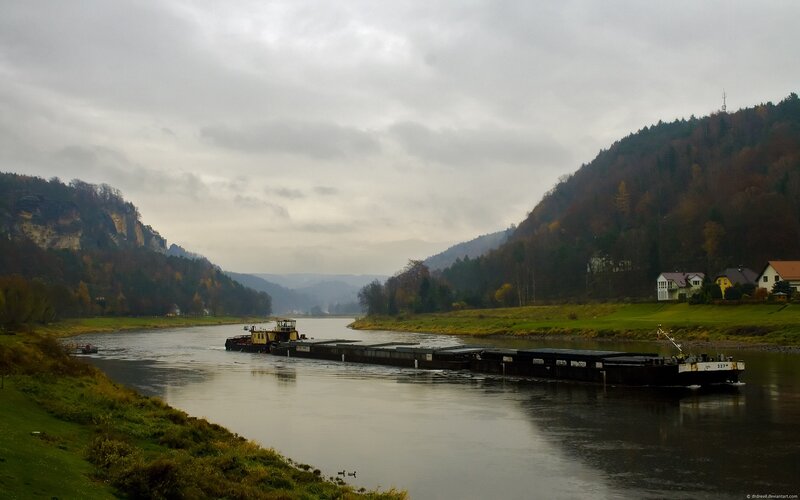 Barge on a river in autumn