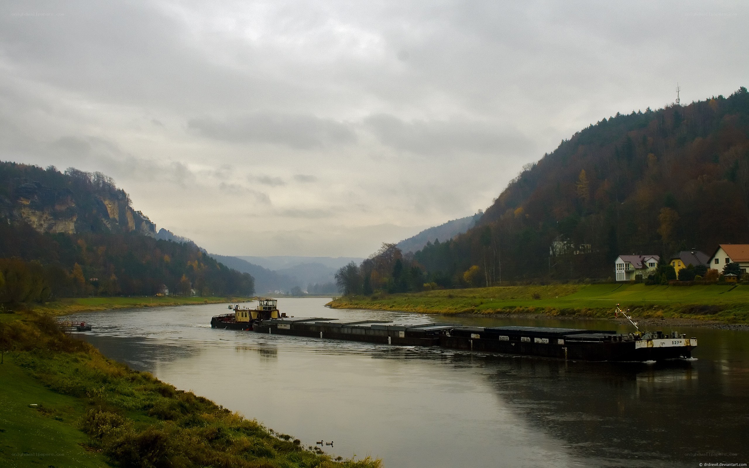 Barge on a river in autumn