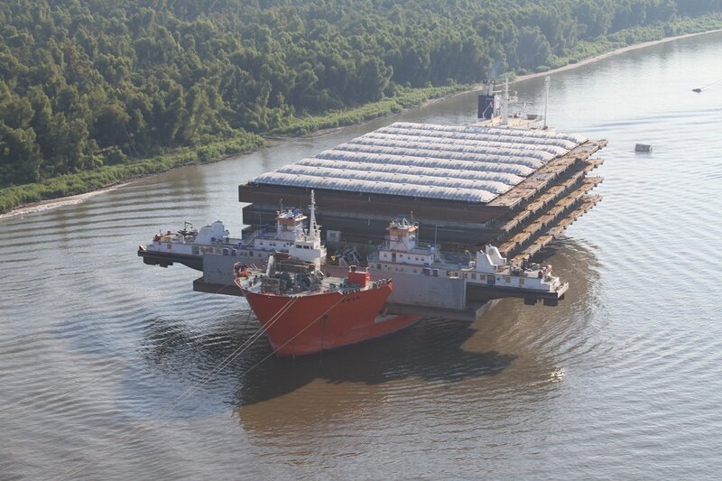 Barge transport on a river