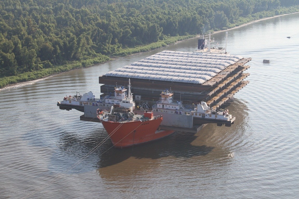 Barge transport on a river